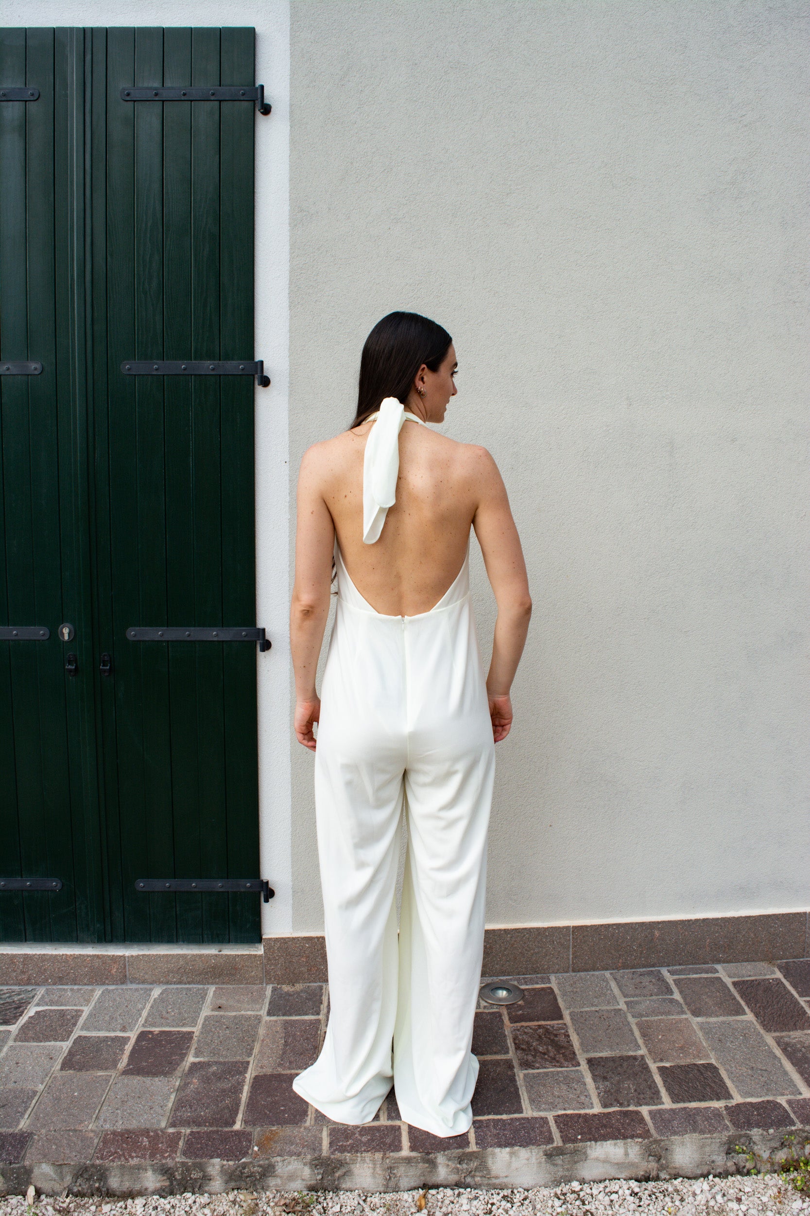 Jumpsuit lunga allacciata al collo