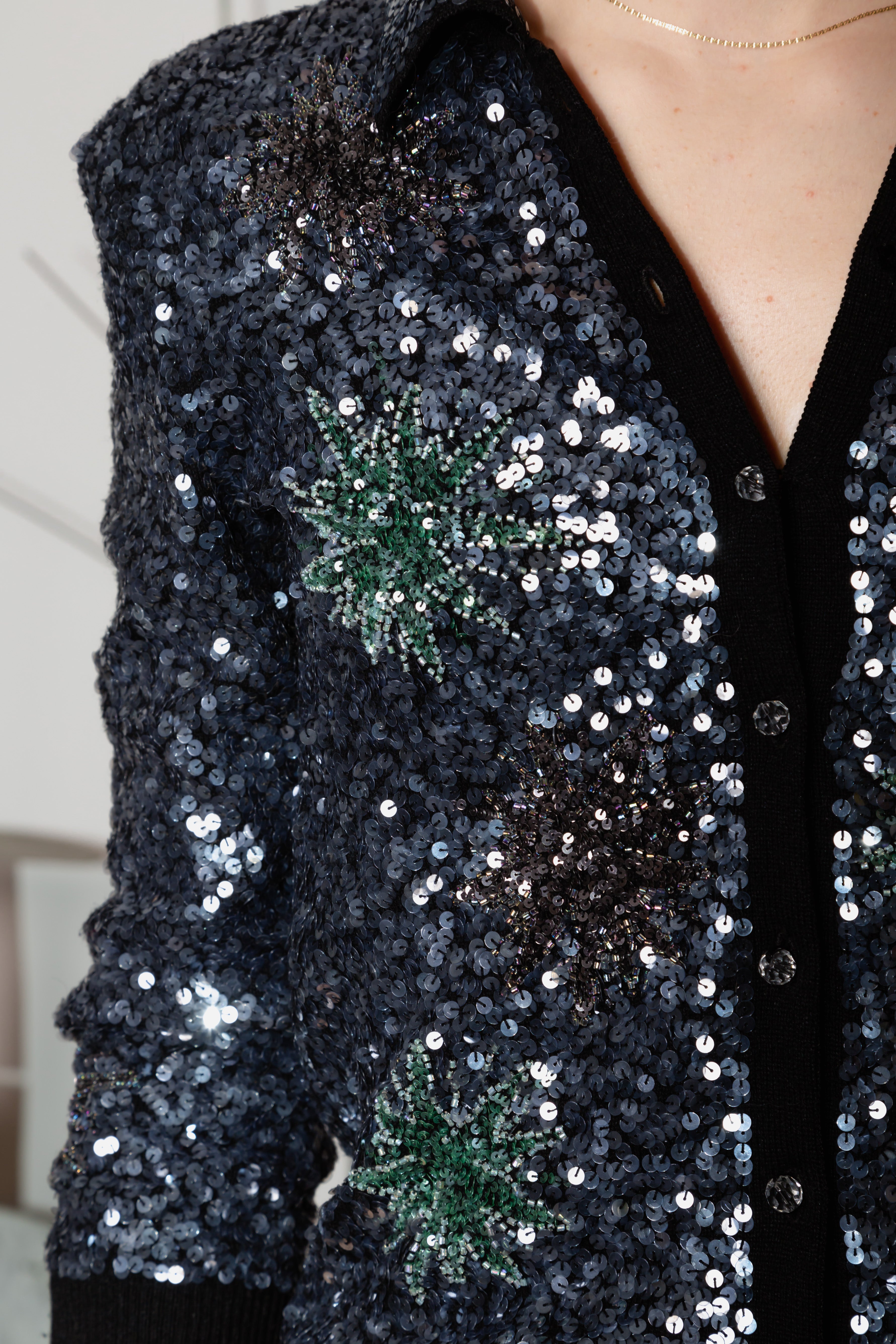 Cardigan paillettes con maniche a tre quarti