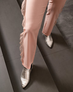 Pantaloni con rouches laterali