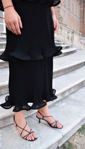 Dress with pleated flounces