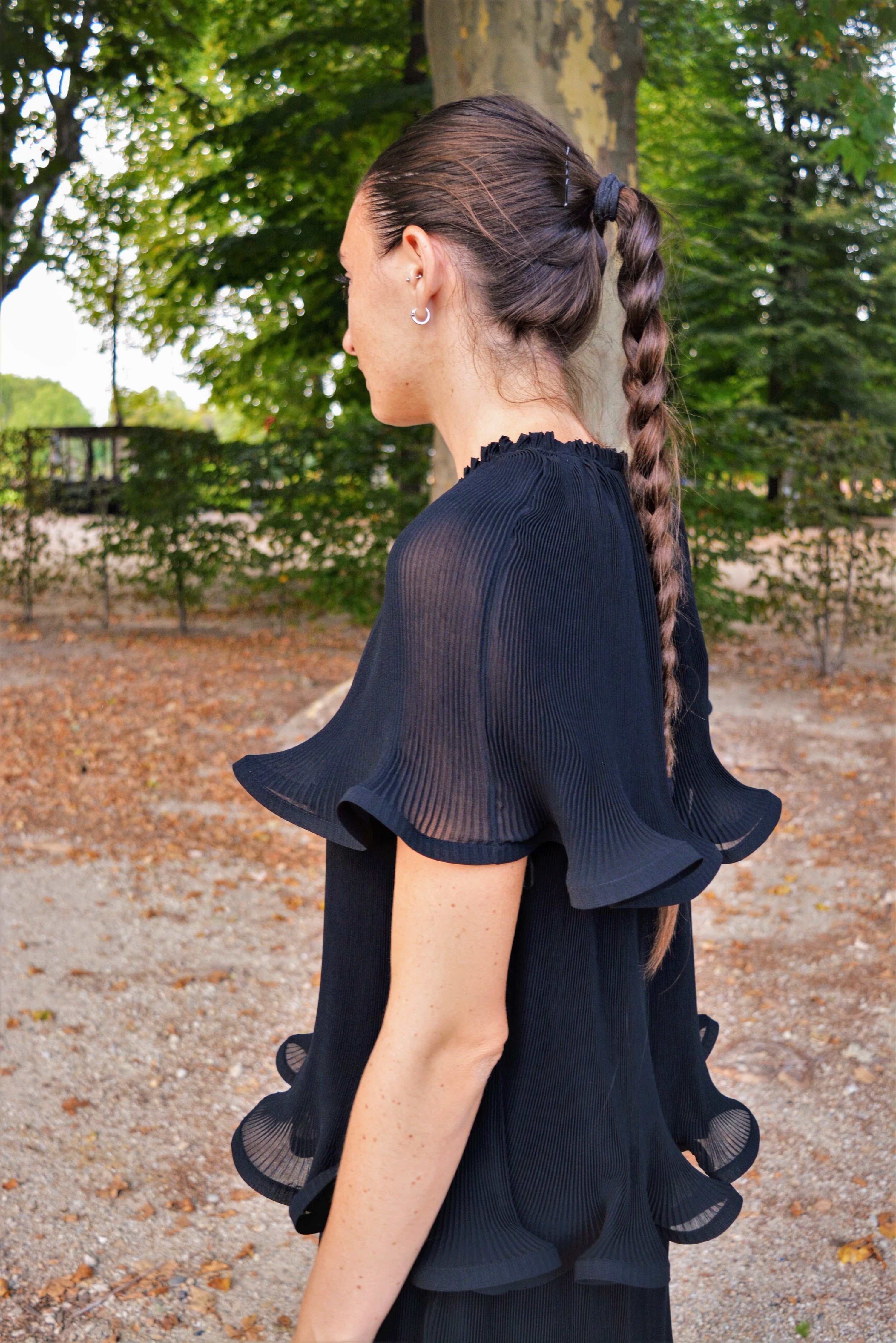 Dress with pleated flounces