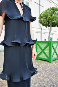 Dress with pleated flounces