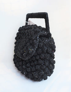 Borsa a mano con micro paillettes