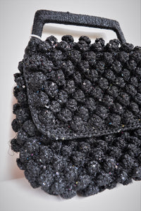 Borsa a mano con micro paillettes