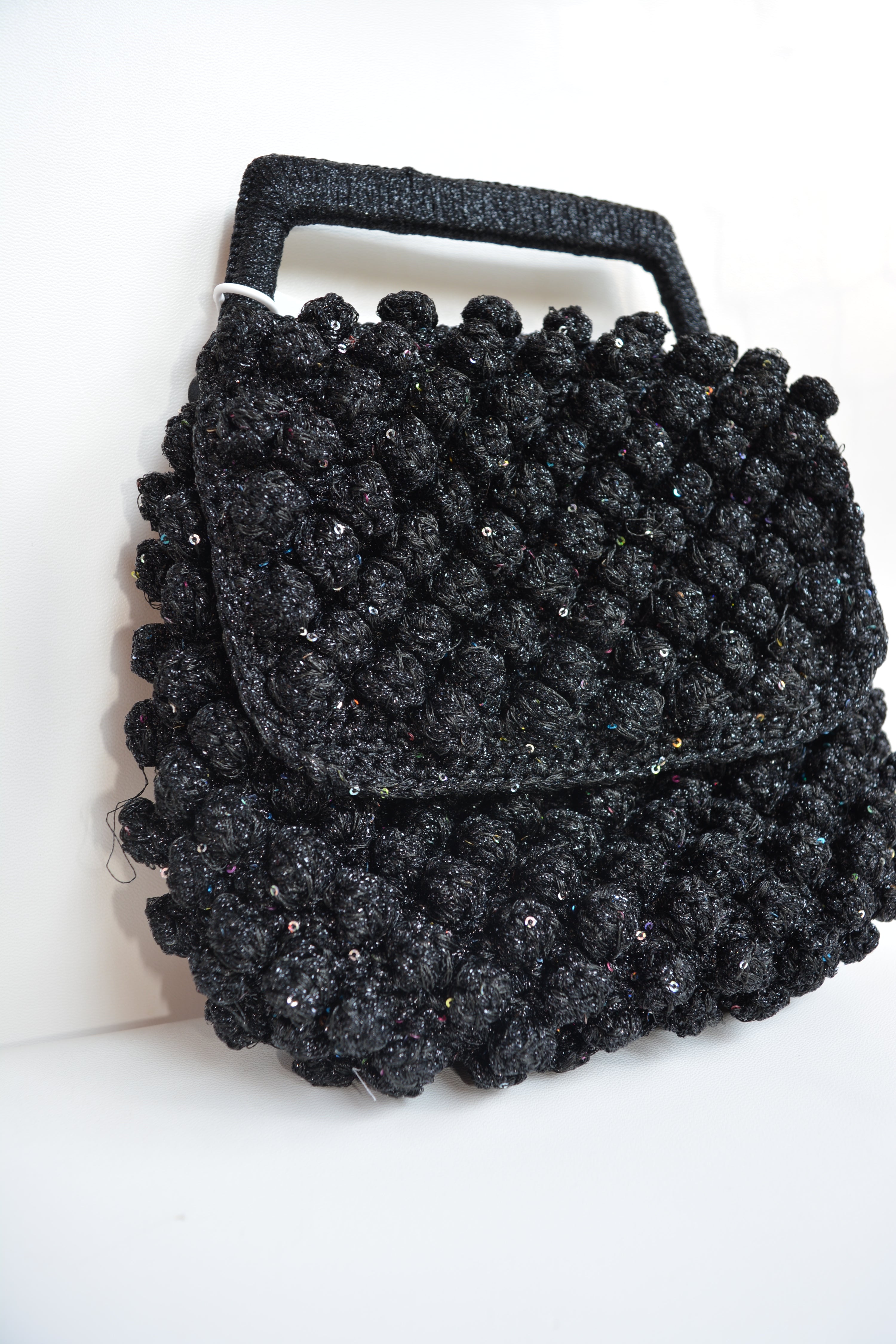 Borsa a mano con micro paillettes