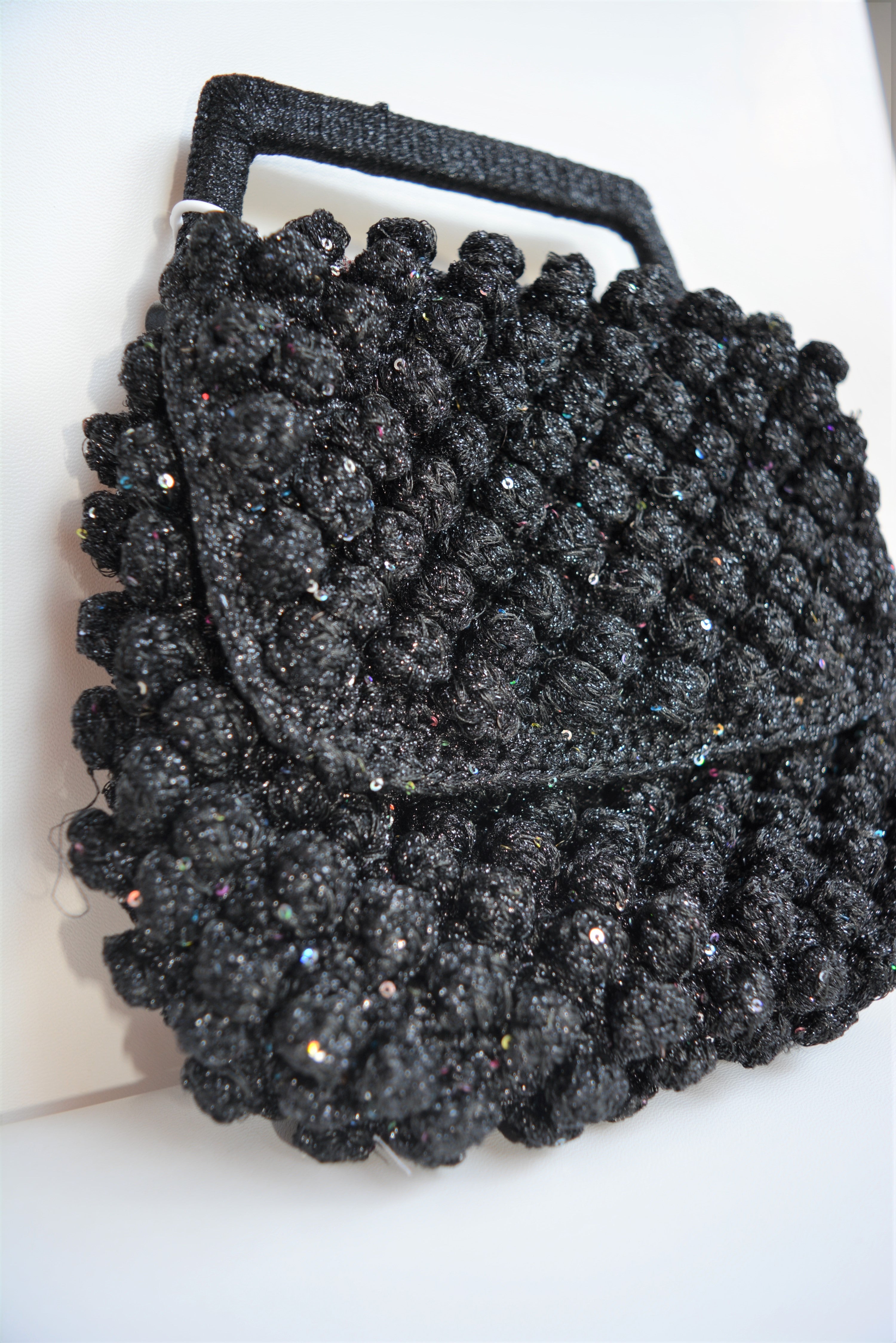 Borsa a mano con micro paillettes